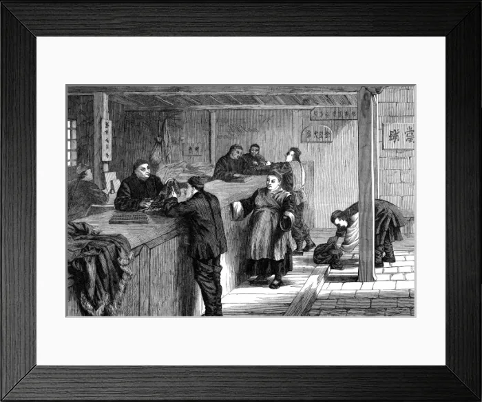 Framed Print : A pawnbroker in Shanghai does business with his customers