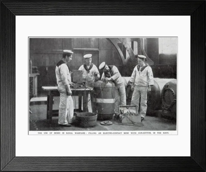 Framed Print : Filling an electro-contact mine with gun-cotton in the Navy. Date: August 1914