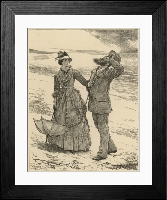 Framed Print : A Couple stroll along the beach Framed Print : A Couple stroll along the beach