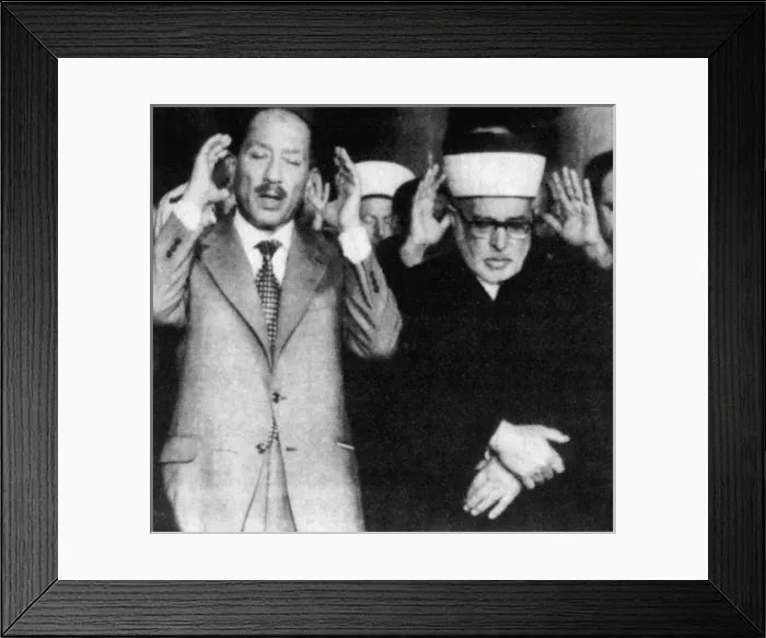 Framed Print : Anwar Sadat at prayer