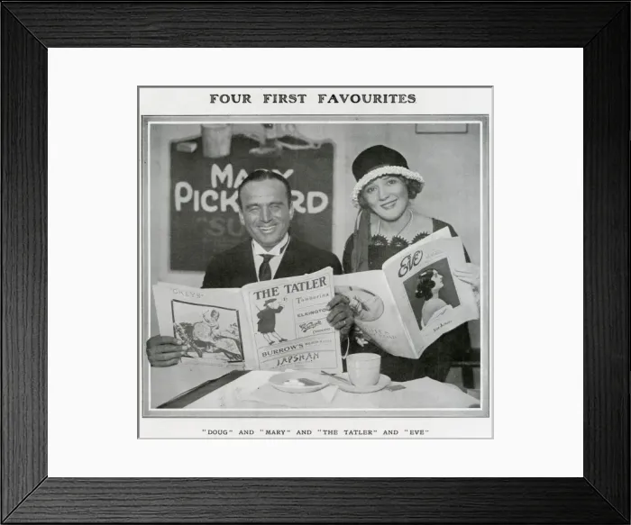 Framed Print : Douglas Fairbanks and Mary Pickford Reading the Tatler and E