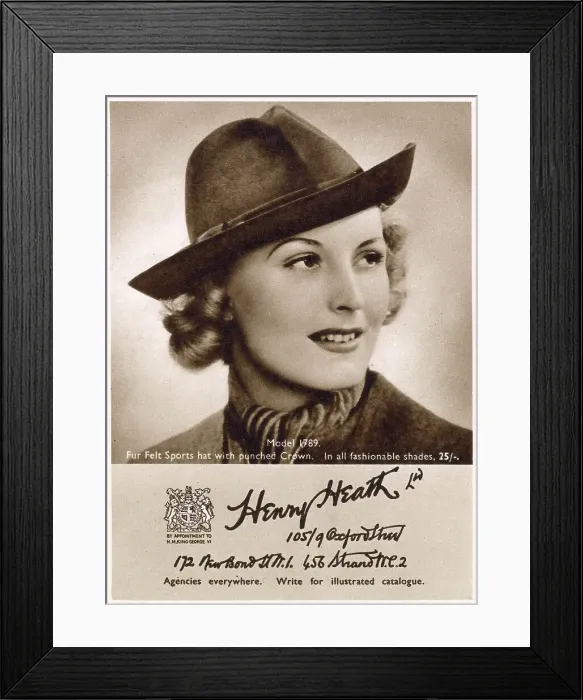 Framed Print : Woman wearing felt homburg hat. Date: 1940 Framed Print : Woman wearing felt homburg hat. Date: 1940