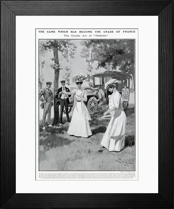 Framed Print : Two women playing Diabolo in France while a mechanic fixes their car. Date: 1907 Framed Print : Two women playing Diabolo in France while a mechanic fixes their car. Date: 1907