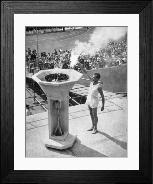 Framed Print : John Mark lights the Olympic bowl, opening ceremony, 1948 Framed Print : John Mark lights the Olympic bowl, opening ceremony, 1948