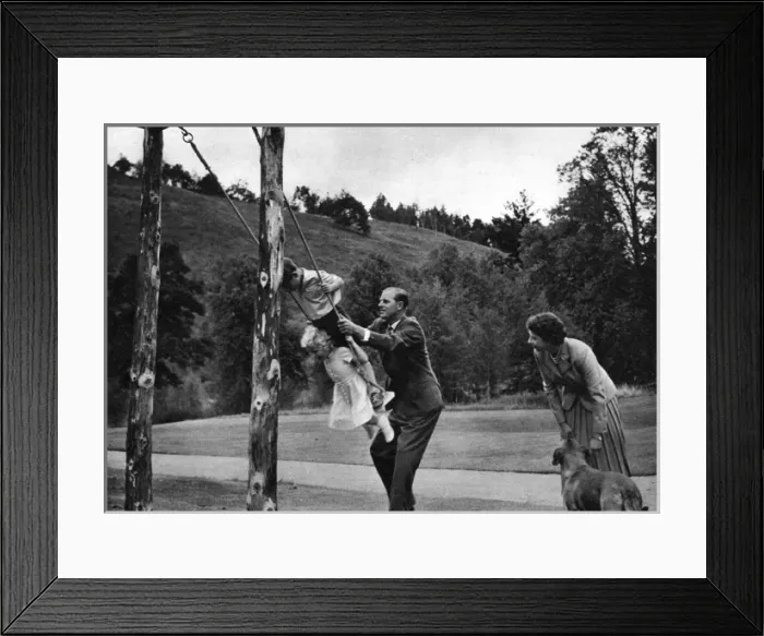 Framed Print : The Queen and Prince Philip play with their children