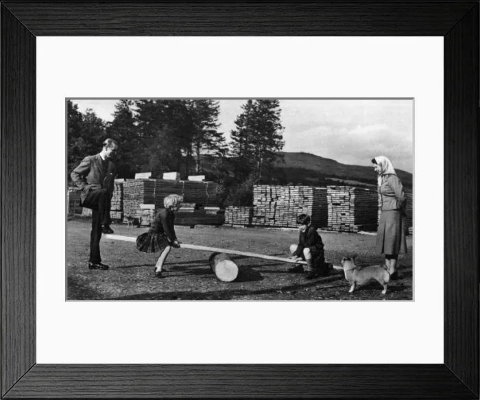 Framed Print : Queen Elizabeth IIs children on a see-saw, 1957