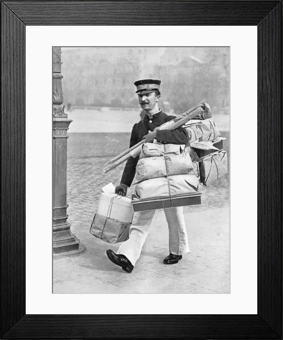 Framed Print : French parcel delivery man at Christmas, 1913