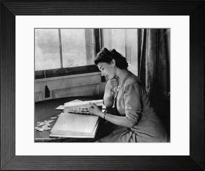 Framed Print : The Queen with her stamp collection