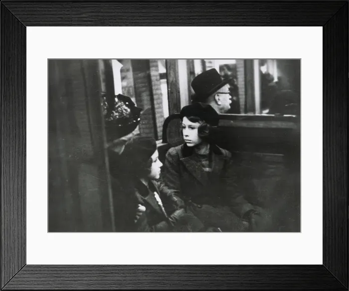 Framed Print : A much publicised first trip on the London Underground for Princesses Elizabeth (Queen Elizabeth II) and Margaret Rose, who made the trip on a District Line train from St. James's Park station with their governess on 15 May 1939. Date: 1939 Framed Print : A much publicised first trip on the London Underground for Princesses Elizabeth (Queen Elizabeth II) and Margaret Rose, who made the trip on a District Line train from St. James's Park station with their governess on 15 May 1939. Date: 1939