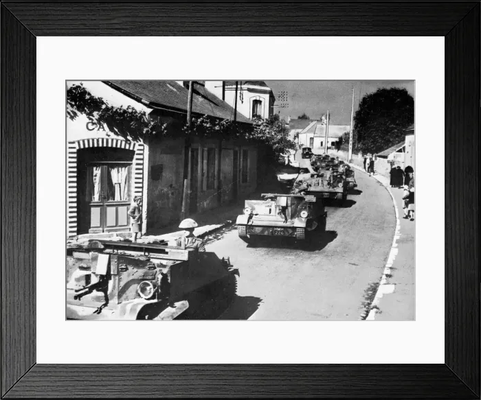 Framed Print : British machine gun carriers passing through French village Framed Print : British machine gun carriers passing through French village