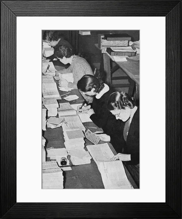 Framed Print : Filling in ration books Framed Print : Filling in ration books