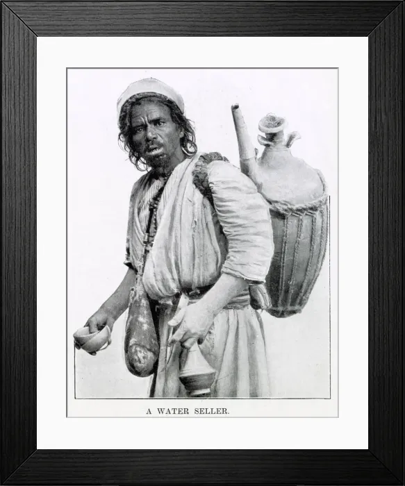 Framed Print : Egyptian man selling water from a clay jug on his back in Cairo, Egypt