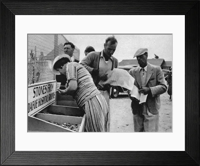 Framed Print : Dionne quintuplets, 1936: souvenir stone sought by tourists Framed Print : Dionne quintuplets, 1936: souvenir stone sought by tourists