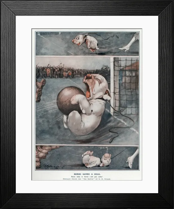 Framed Print : Bonzo saves a goal by George Studdy Framed Print : Bonzo saves a goal by George Studdy