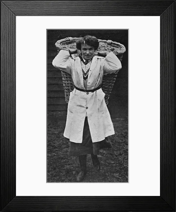Framed Print : Miss Gowing the hockey player as farm labourer, WW1 Framed Print : Miss Gowing the hockey player as farm labourer, WW1