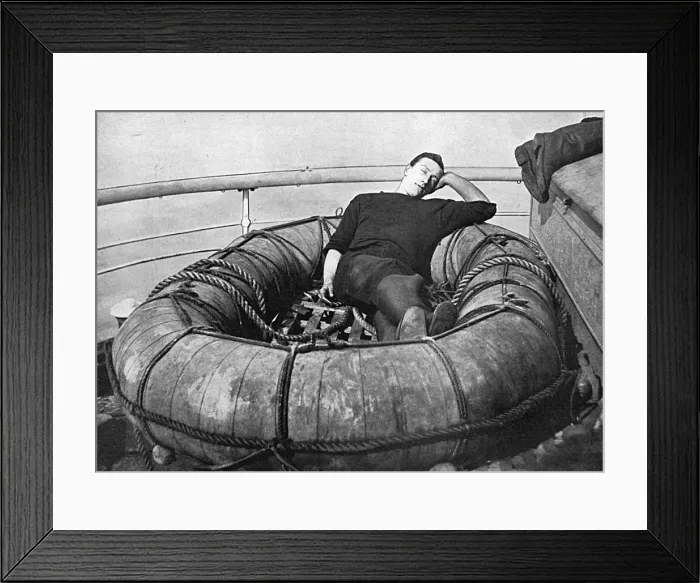 Framed Print : British sailor snoozing on deck, WW1 Framed Print : British sailor snoozing on deck, WW1