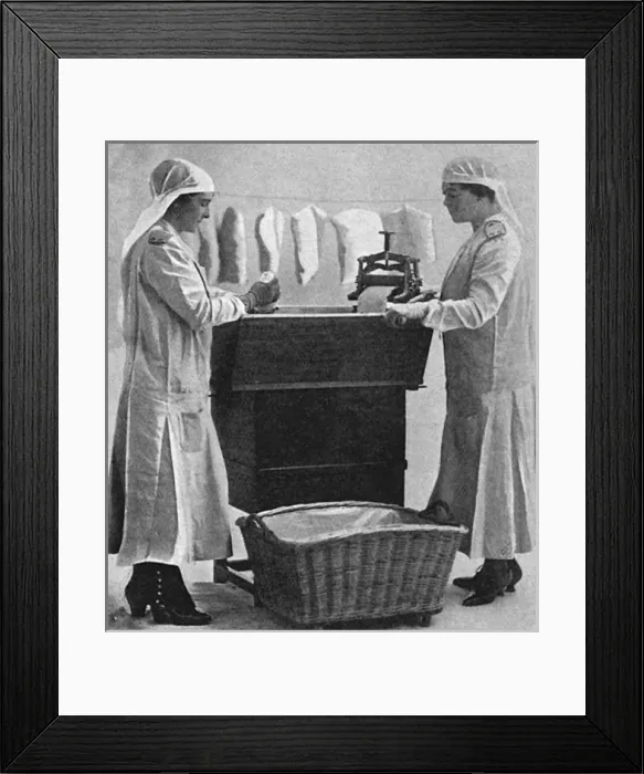 Framed Print : Mrs Lawrence & Mrs Mason carbonising garments for troops, WW1 Framed Print : Mrs Lawrence & Mrs Mason carbonising garments for troops, WW1