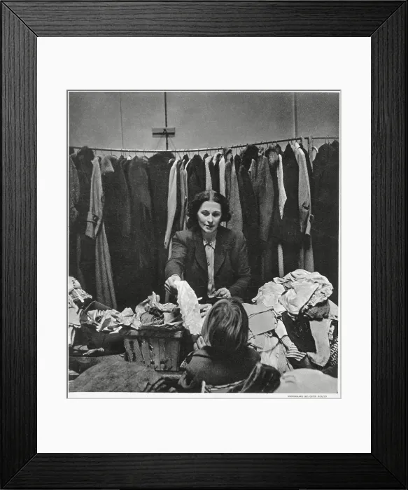 Framed Print : Mrs Robert Hudson wife of Minister of Agriculture and member of the Women's Voluntary Service, in East End, London. Giving out hundreds of articles of clothing and other comforts to homeless people who have lost their belongings Framed Print : Mrs Robert Hudson wife of Minister of Agriculture and member of the Women's Voluntary Service, in East End, London. Giving out hundreds of articles of clothing and other comforts to homeless people who have lost their belongings