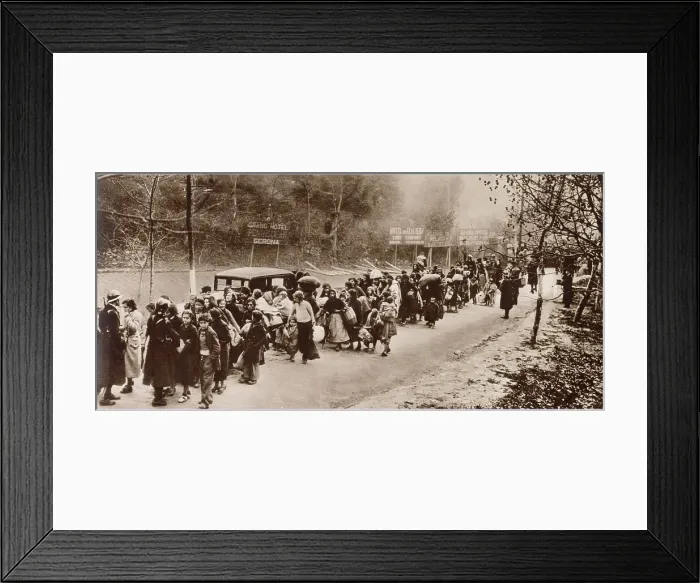 Framed Print : Some of the Republican refugees who fled Spain for France after the fall of Barcelona. Straggling line of women and children marshalled by French Gardes mobiles, while crossing the frontier. Date: January 1939 Framed Print : Some of the Republican refugees who fled Spain for France after the fall of Barcelona. Straggling line of women and children marshalled by French Gardes mobiles, while crossing the frontier. Date: January 1939