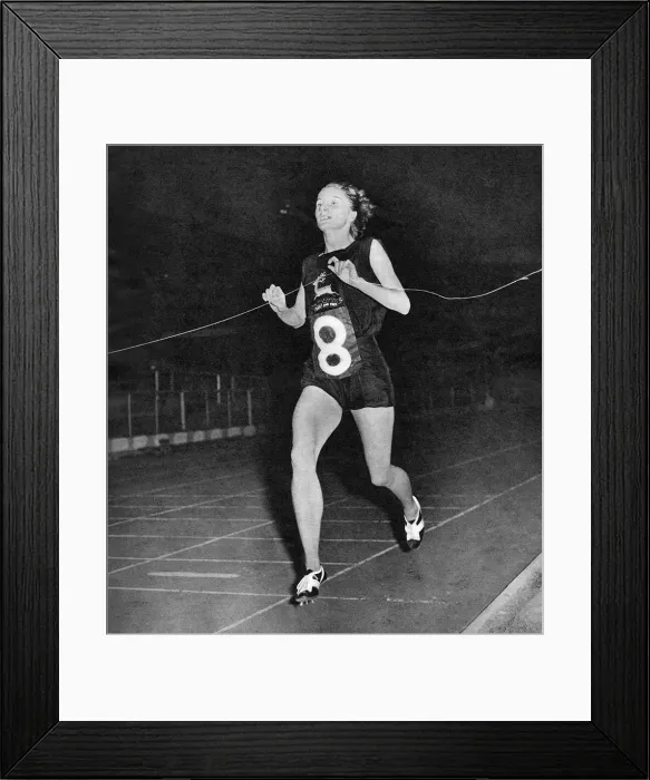 Framed Print : Diane Leather winning the mile race