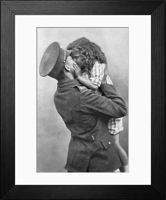 Framed Print : British soldier gets a kiss goodbye, WW1 Framed Print : British soldier gets a kiss goodbye, WW1