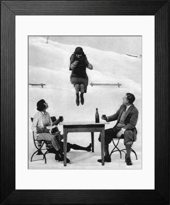 Framed Print : Lady Moss jumping a table on ice skates