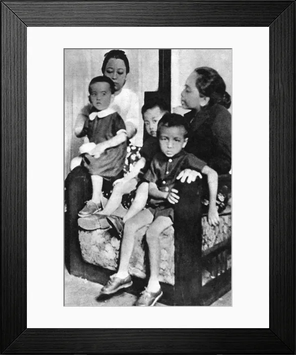 Framed Print : Aung San Suu Kyi as a child after her Fathers Assassination
