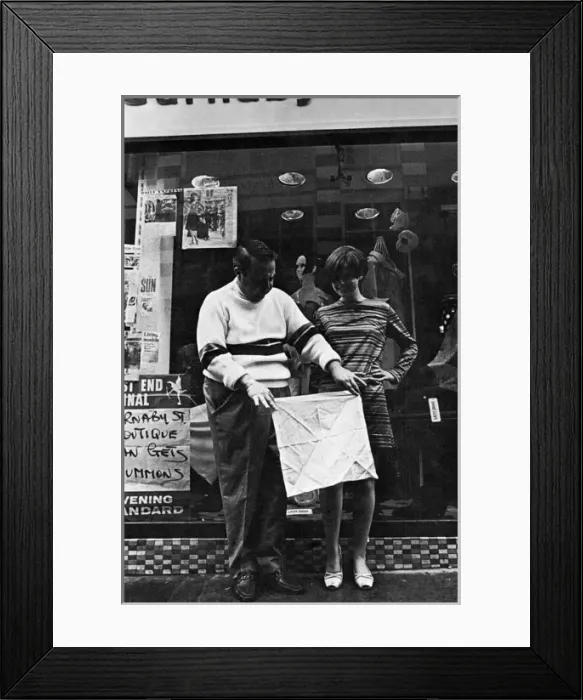 Framed Print : Tina Birch and Allan Sherman outside the Lady Jane boutique