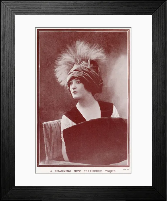Framed Print : Woman wearing a fashionable velvettoque hat with plumes of feathers. Date: 1911 Framed Print : Woman wearing a fashionable velvettoque hat with plumes of feathers. Date: 1911