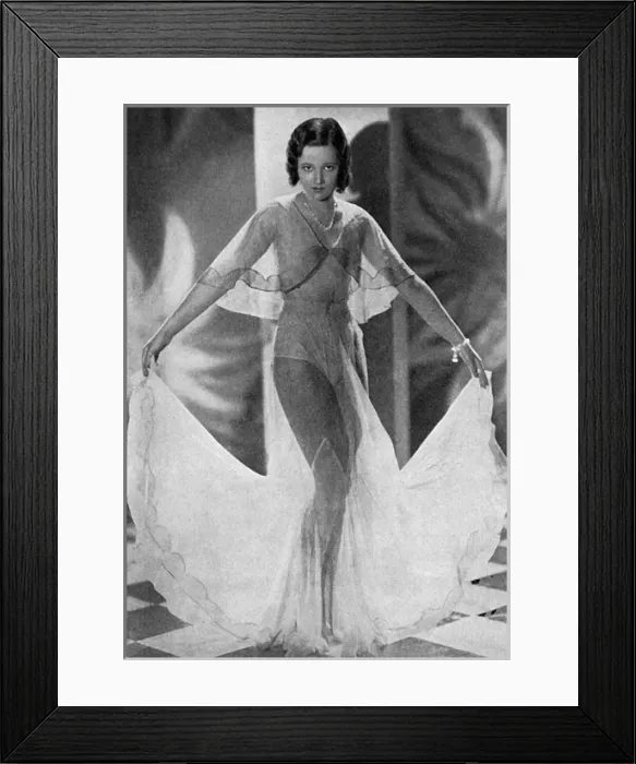 Framed Print : Mr and Mrs Claud Allister reading The Tatler