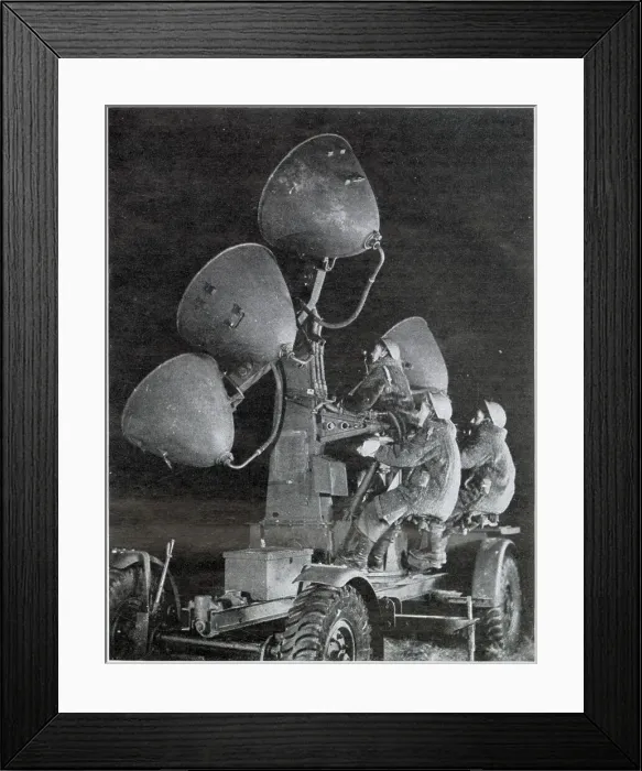 Framed Print : Auxiliary Territorial Service using search lights at night to spot on coming aircraft. Date: 1943 Framed Print : Auxiliary Territorial Service using search lights at night to spot on coming aircraft. Date: 1943