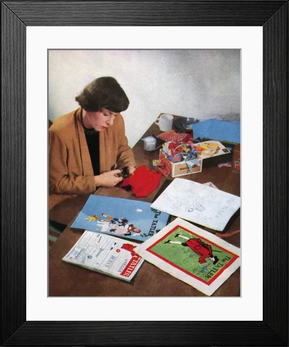 Framed Print : Joan Jordan creating The Tatler Xmas number cover, 1950 Framed Print : Joan Jordan creating The Tatler Xmas number cover, 1950