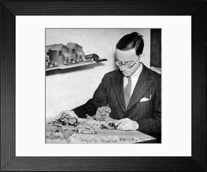 Framed Print : Richard Levin Working on Camouflage