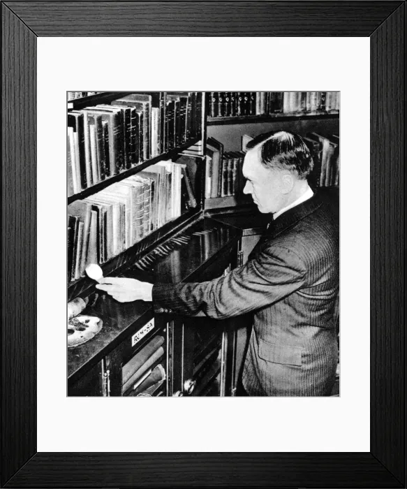 Framed Print : C. J. Purnell Holding an Incendiary Bomb Framed Print : C. J. Purnell Holding an Incendiary Bomb