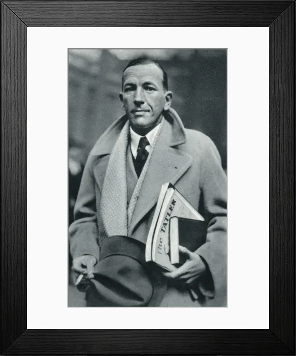 Framed Print : Noel Coward carrying The Tatler Framed Print : Noel Coward carrying The Tatler