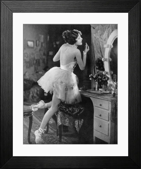 Framed Print : Olive Borden applies lipstick in the mirror Framed Print : Olive Borden applies lipstick in the mirror