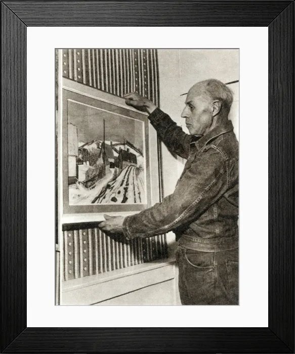 Framed Print : Edward Bawden hanging his painting of Waltham Cross Framed Print : Edward Bawden hanging his painting of Waltham Cross
