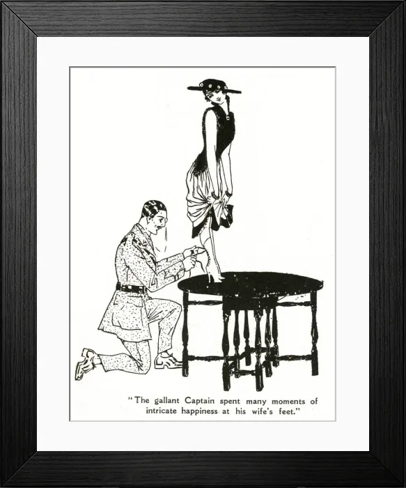 Framed Print : Military man lacing his wifes boots, 1916 Framed Print : Military man lacing his wifes boots, 1916