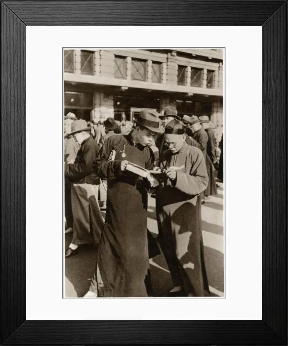 Framed Print : Shanghai Races - studying the form-book Framed Print : Shanghai Races - studying the form-book