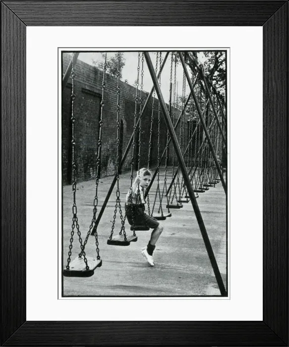 Framed Print : Young boy alone on a playground swing 1939 Framed Print : Young boy alone on a playground swing 1939
