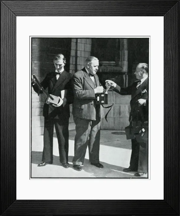 Framed Print : Polish national Mr Hutton offering gas mask cases 1939