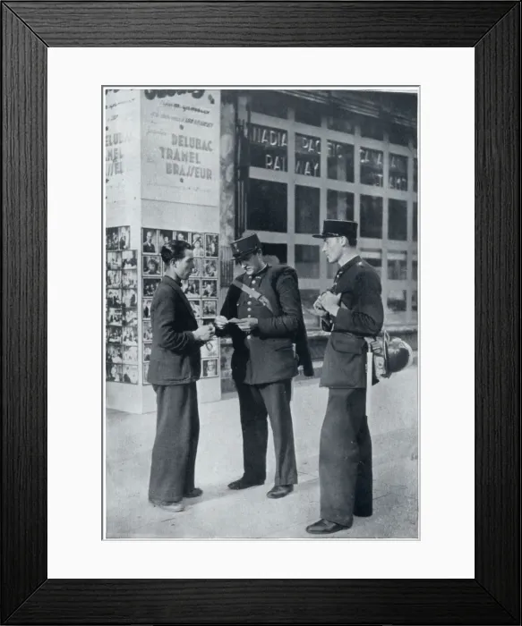 Framed Print : Man shows identity papers to gendarmes, September 1939