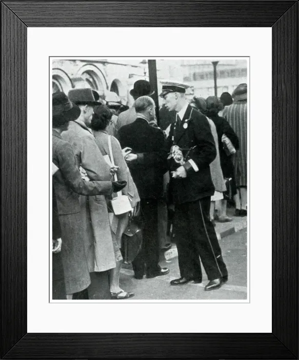 Framed Print : Bus conductor collecting fares from queuers, September 1939 Framed Print : Bus conductor collecting fares from queuers, September 1939