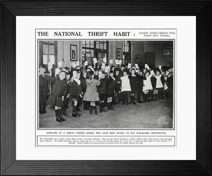 Framed Print : Photograph of children in a North London school holding up their National war-savings certificates. The children bring their money in week by week until the coveted total of 15s Date: 1917 Framed Print : Photograph of children in a North London school holding up their National war-savings certificates. The children bring their money in week by week until the coveted total of 15s Date: 1917