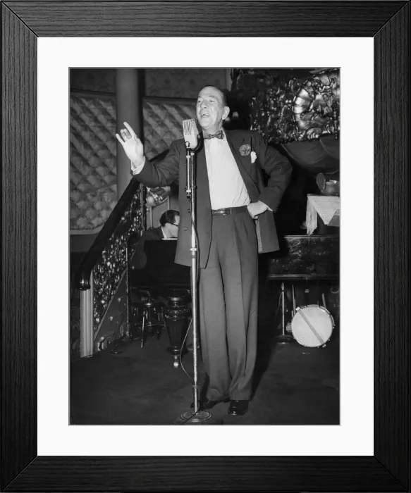 Framed Print : Noel Coward in cabaret at the Cafe de Paris