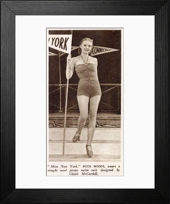 Framed Print : Ruth Woods wears a simple wool jersey swim suit designed by Claire McCardell at a fashion Framed Print : Ruth Woods wears a simple wool jersey swim suit designed by Claire McCardell at a fashion