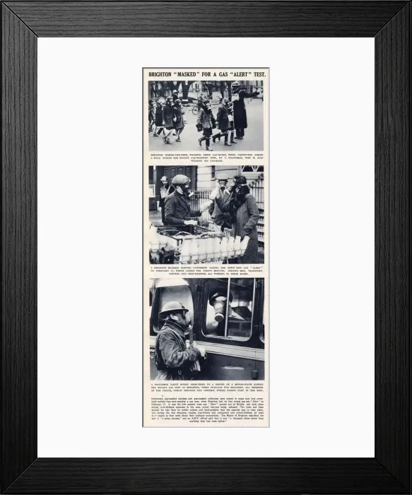 Framed Print : Citizens of Brighton shown wearing gas masks in everyday situations in 1941