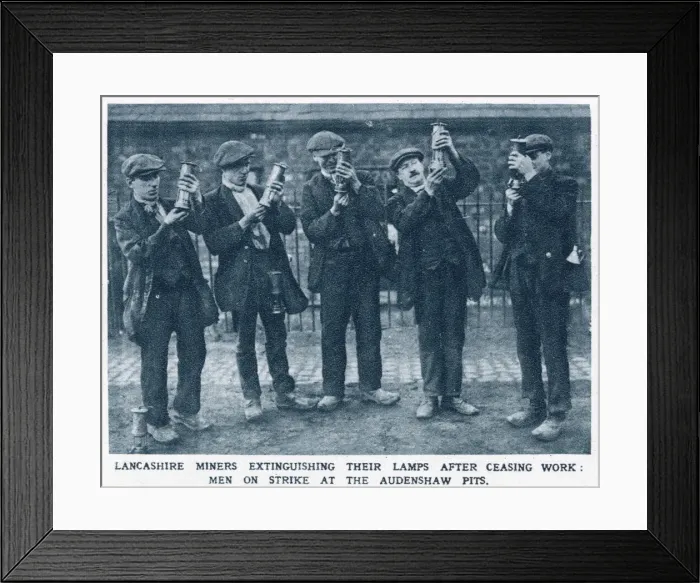 Framed Print : Lancashire miners extinguishing their lamps after ceasing work