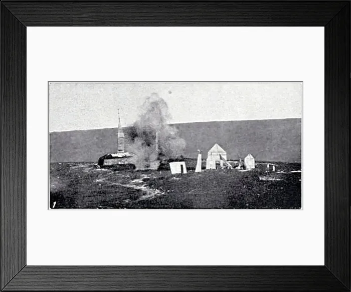 Framed Print : A dummy village made of canvas used for Artillery practise with Lyddite shells - near Okehampton, Dartmoor. A shell explodes near the Church'. Date: 1912 Framed Print : A dummy village made of canvas used for Artillery practise with Lyddite shells - near Okehampton, Dartmoor. A shell explodes near the Church'. Date: 1912