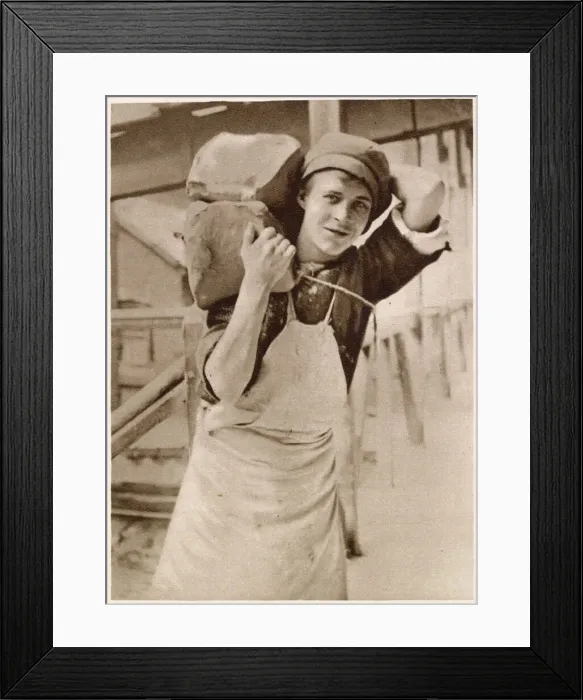 Framed Print : A young lad carrying the clay. Date: 1913 Framed Print : A young lad carrying the clay. Date: 1913